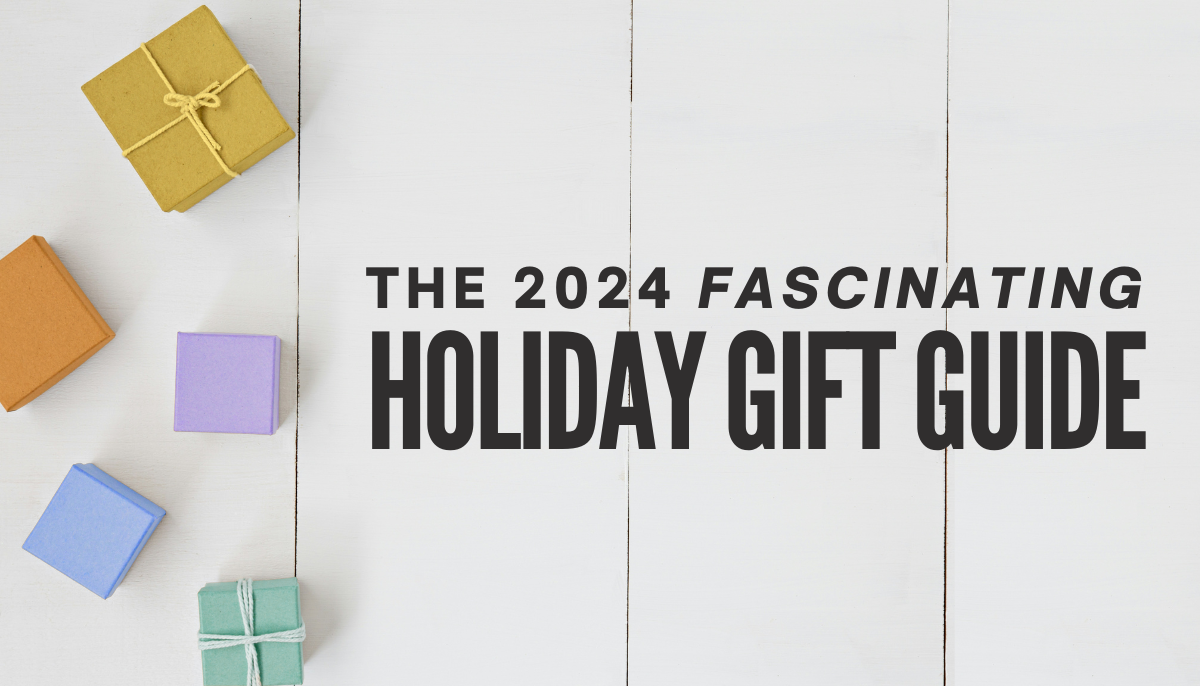 Colorful gift boxes arranged on a white wooden background with text that reads 'The 2024 Fascinating Holiday Gift Guide.'